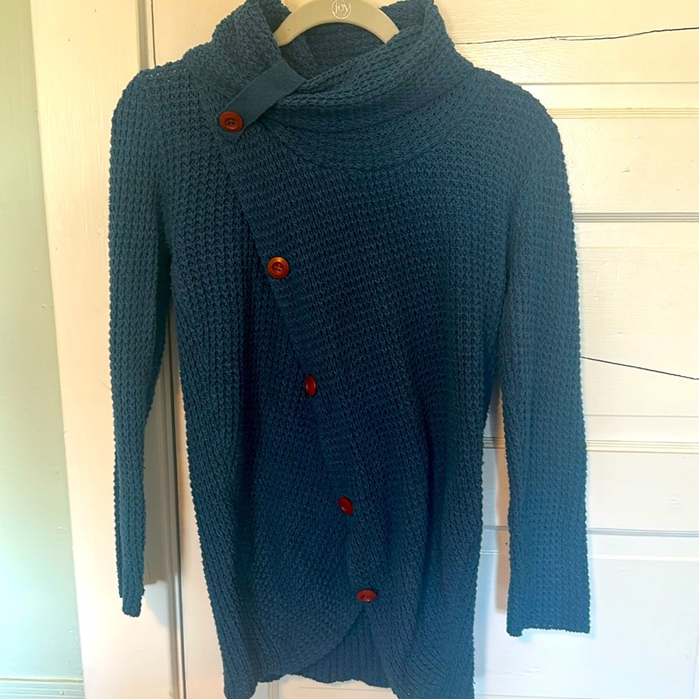 Asymmetrical Knit sweater with button detail. Ladies bought off Amazon.